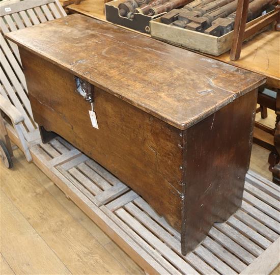 A 17th century oak six-plank coffer W.107cm